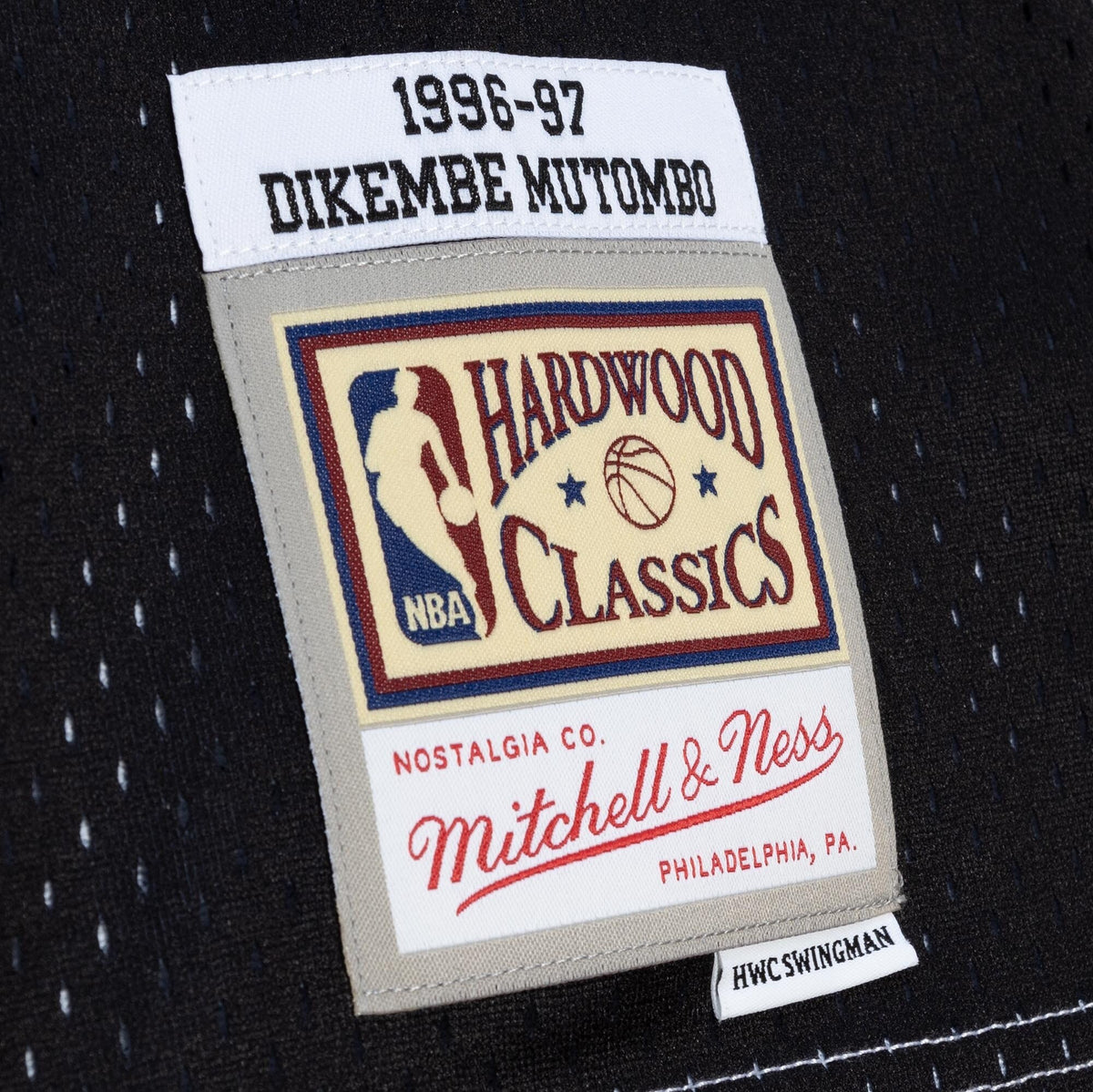 Atlanta Hawks Mitchell & Ness Dikembe Mutombo 1996 Split Swingman Jersey - Black/White